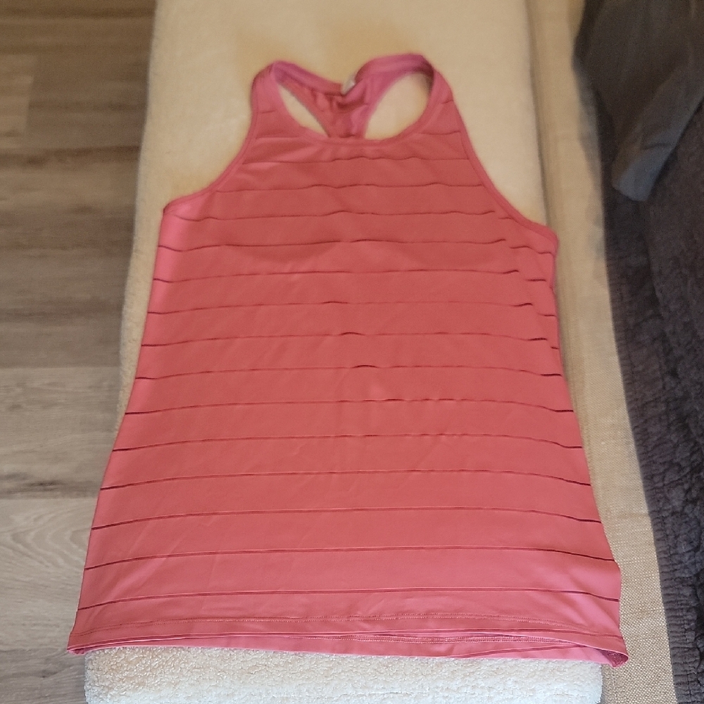 Athleta Pink Tank Top with Breathable Fabric and Sleek Design